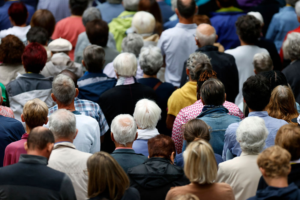 group of people worshipping